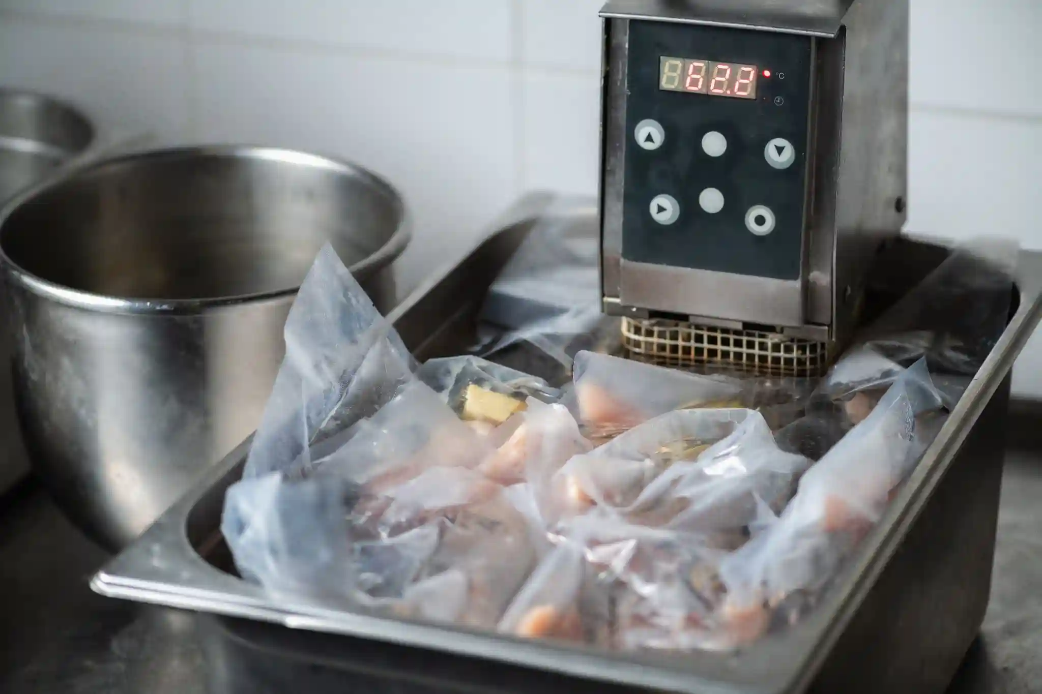 How does sous vide cooking differ from traditional cooking methods?
